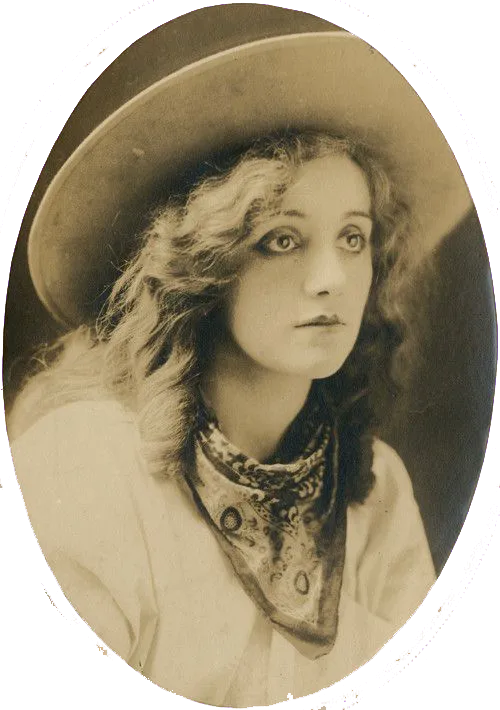 Johanna McAllister at age 25, a woman with curly blonde hair, wearing a wide brimmed hat and a bandana.